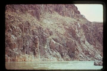 The left bank of the river at the head of Separation Rapid where Powell got rimmed and claimed he would have dropped 400 ft. into the river had he loosed his hand-hold.  The fraud is obvious