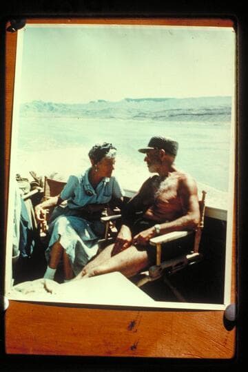 Margaret Marston explains to Dock some of the rim activities during the June 1957 cruise of Grand Canyon