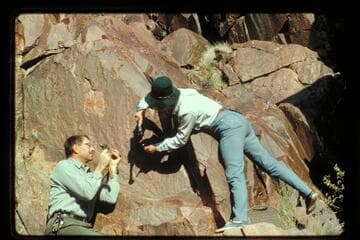 Ranger Jim Bailey, Frankie Strathairn.  Hard rock drilling at Separation Canyon for replacing the 1934 plaque