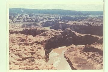 Down Glen Canyon to mouth of 73.6.  The mouth of 71.25 is beyond at the cactus flat