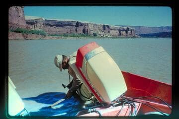 Carroll Lambeth hammers out a prop, Mile 25; Stillwater Canyon