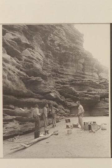 Camp on right bank near Mile 115; Tapeats formation.  Left to right:  Jordan, Sanderson, Taylor and MacDonald
