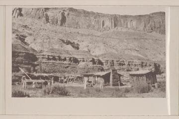 View looking southwest across the canyon at Hite.  Wall includes Permian (Organ Rock), Triassic and Jurassic (?), (Wingate and Kayenta)