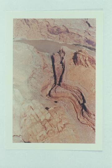 Northwest to Glen Canyon with small drainage entering at Mile 101.7