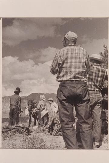 Preparing the packs for the drop into Navajo Canyon.  Buck Whitehat; Nancy Daly; F. E. Masland; Tom Daly; Jorgen Visbak; Bill Belknap
