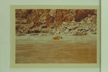 Jack Brennan, in his glass outboard unit, cuts out of the rough water at Mile 24.5