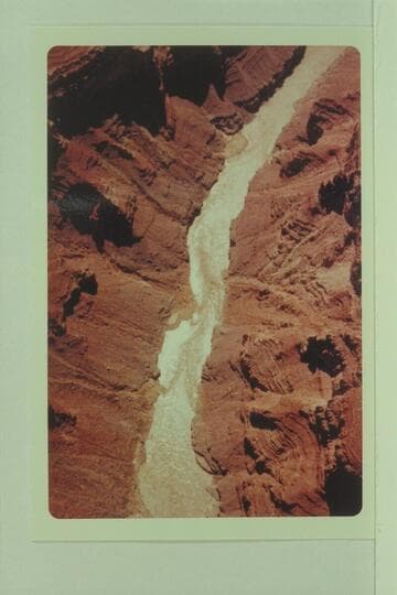 Down river from the foot of 24.5 Mile Rapid to 25 Mile Rapid and the fan at Mile 25.2