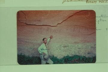 "J W BLACK FEB 2 1894" inscription in cave above Escalante River in Glen Canyon