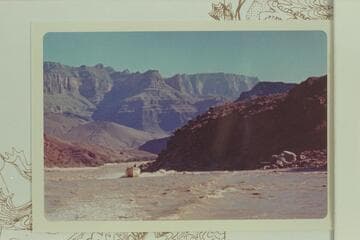 The "Dock" up through the riffle at Mile 66.  Buzz Belknap at the wheel and Ed l'Anson piloting.  Taken from the "Wee Red."