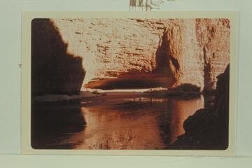 Redwall Cavern at low water.  Powell declared the cave would hold 5,000 people