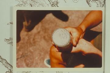 Identification of junk left at old camp at Mile 69.7 left bank