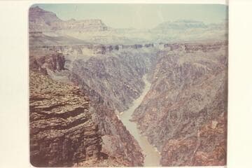 Downriver from top of Tonto at edge of gorge at Mile 80.1.  Grapevine Rapid is in middle distance, Mile 81.5.  The river disappears at Boulder Creek near Mile 83.  Isis and Shiva are upper right