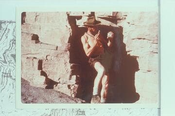 Doc Ellis at mouth of short adit at Hance Asbestos Mine