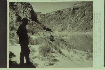 Mack Miller looking down at Diamond Creek Rapid after failing contact by radio with the plane which flew over