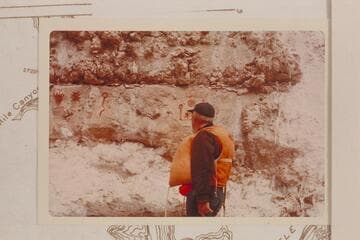 Dock Marston studies the Hopi Salt and the paintings at Mile 62-63 left bank