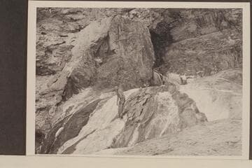 Mouth of Travertine Canyon.  Hugh Cutler tries to find a way down.  Chuck Richey tries to find a way up