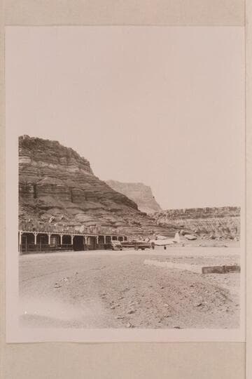 Art Greene's Cliff Dwellers Lodge.  Motor car; speed boat ready for Grand Canyon traverse; plane in from Los Angeles