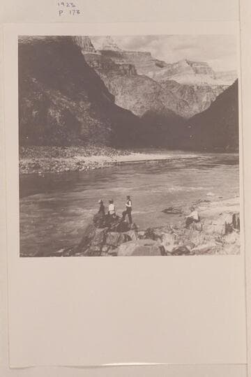 [Photo from a stereo]  Beside the Colorado; looking up to Zoroaster Tower from Pipe Creek, Grand Canon of Arizona