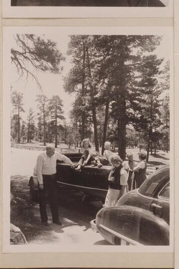 Grandchildren of Dr. and Mrs. Bryant aboard the "BOO" at Grand Canyon, south rim.  Dr. Harold Bryant at the left.  Mrs. Bryant at the bow of the boat.  Margaret Marson 2nd from right