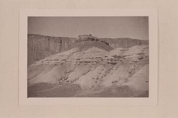 Butte topped by watch tower.  Fort Bottom