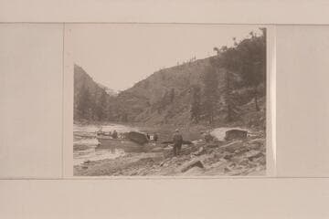 The scow on the beach, the sweeps unshipped and the dunnage going ashore