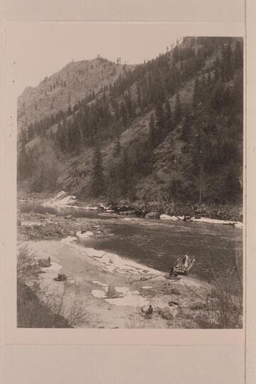 Camp on the icy beach.  The tent is rigged on the scow