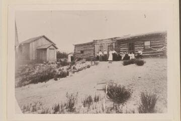 First church in Bluff.  Harshberger wrote on back:  Old Cabin Home, Bluff, Utah