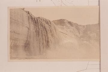 First mud wave of a glood over Grand Falls