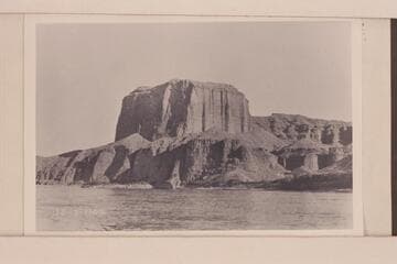 Conglomerate Butte above Virgin River.  Known as the Temple or the Mormon Temple, the formation is on the right shore of present Lake Mead which covers nearly all the lower slopes
