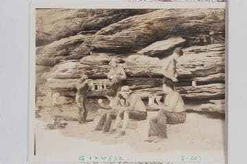 Crew members of the Dusty Dozen at lunch below Fossil Canyon