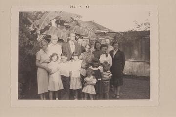 Eva Galloway family group--Mrs. Victor Nielson.  Adults:LaBarge Nielson Tilford, 40-yr. old daughter of the Nielsons;Eva Nielson(60);Shirley, Thormin's wife (32);Louise, Douglas' wife (27);Mrs. Tilford(Bob's mother),54.Men:Victor Nielson (61); Roger(22)