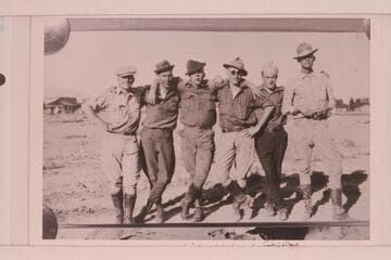 Part of USGS crew at Green River before start of the survey of Cataract Canyon under direction of W. R. Chenoweth.  At Greenriver, Utah.  Hite/Hyte; Morgan? Lint; Woodward; Clogston; truck driver--Phelps?