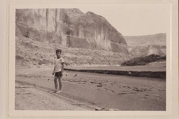 Jackie Frost--Frank E. Frost.  On the San Juan run with Nevills.  Right bank of the Colorado across and downstream from the mouth of the San Juan.  Approximately Mile 77.  Very low water