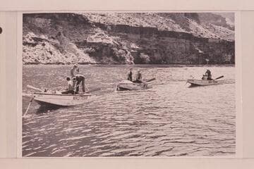 The Nevills' boats at the end of his first Grand Canyon traverse; Lake Mead.  In the "WEN"- Clover, Nevills and Kolb; in the "Mexican Hat"- Jotter and Bell; and in the "Botany"- Reed and Gibson