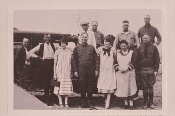 The party of Governor Dern was en route to Hite and stopped at Hanksville where they were photographed with some of the town folk