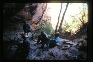 Lunch under overhang in tributary of Halls Creek below Baker Ranch