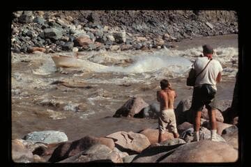 "Wee Red" climbing Dubendorff Rapids