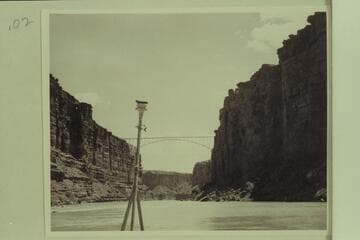 The highway bridge across Marble Gorge.  Lees Ferry 57,900 cfs.  The tripod was used for a small motion picture camera