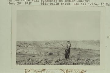 Fern Davis at rim of Desolation Canyon at Mile 62 where an old stone wall suggested an Indian lookout
