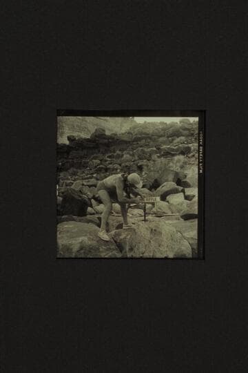 The sign and the inscription at Brown's Riffle.  Mile 12.  Marble Canyon