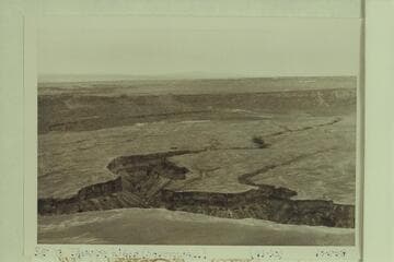 Southeast to Tanner Wash which drains into Sheerwall Rapid