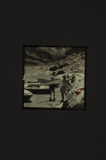 The spran shields which were torn from the decks in North Canyon Rapid.  Left to right:  Taylor, Masland, Desloge, Belknap.  21 Mile Rapid