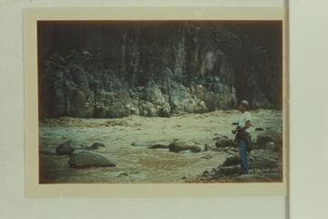 Granite Falls- Monument Rapid.  Ellery Gibson stands at the shore