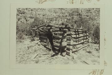 Cabin at left bank below mouth of Chandler Creek
