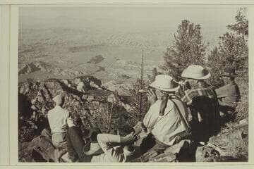 Viewing the terrain between Navajo Mountain and the Henry Mountains.  The junction of the San Juan and Colorado Rivers is in the middle distance.  L to R:  Marston, Tom Daly, Masland, Belknap, Grey Mountain