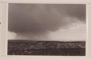 Storm over Navajo Canyon.  White Mesa in distance
