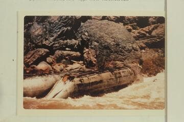 Baloney floating from big hole in Vulcan Rapid after capsizing