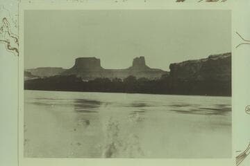 19.  On the Green River, No Identification.  Brown-Stanton party.  The Buttes of the Cross from the left bank of Green River at about Mile 30.  Townsite or Anderson Bottom is the low land across the river