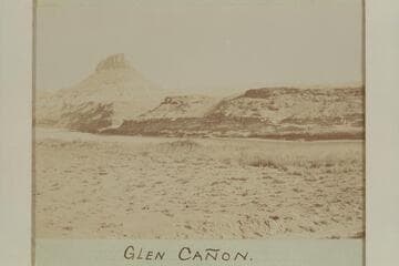 Castle Butte, left bank, mile 151, Glen Canyon.  "Glen Canon.  Upper rock, except one butte, eroded and gone several miles back from the river."
