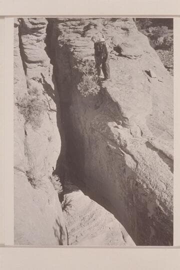 Natural bridge from above.  Ballard Atherton and Jorgen Visbak stand on top.  Masland is proposing the name, "Whitehat Bridge."